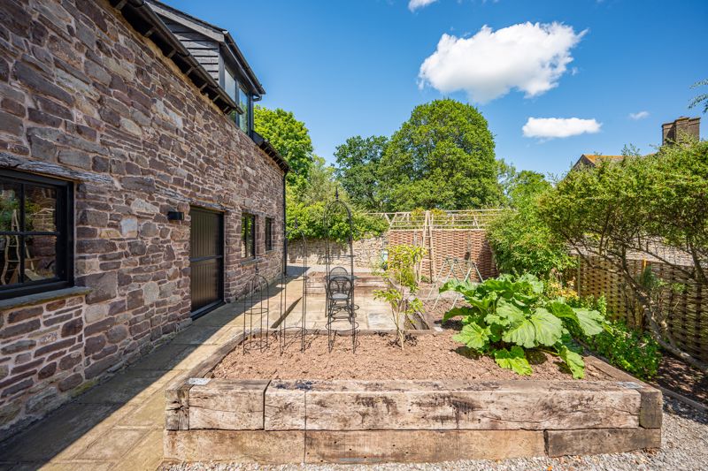 Rear Courtyard and Raised Beds- click for photo gallery